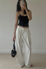 by DOE - Triple Pleated Low Waist Wide Leg Trousers